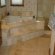 Tumbled stone tile for shower