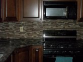 Grouting glass stone mosaic tile backsplash
