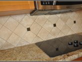 Natural stone tile backsplash install